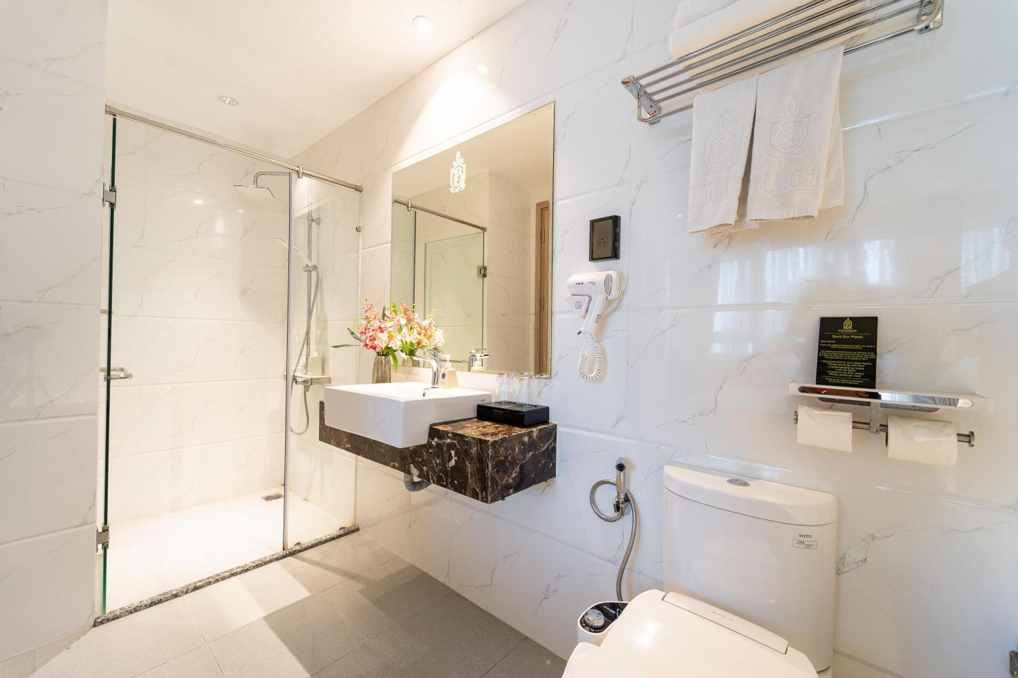 Nicecy Hotel Suites & Spa Cidade de Ho Chi Minh Quarto foto