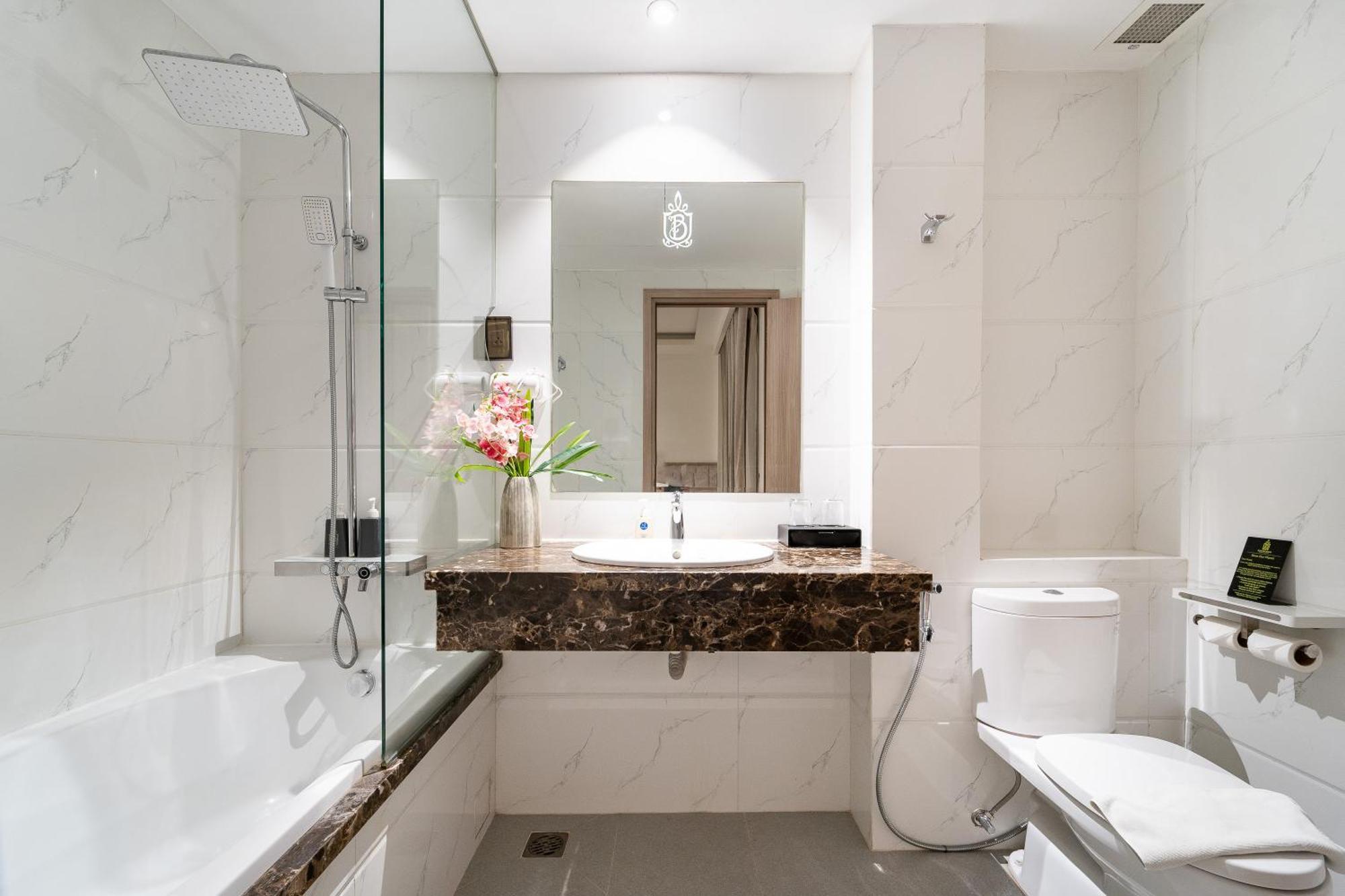Nicecy Hotel Suites & Spa Cidade de Ho Chi Minh Quarto foto