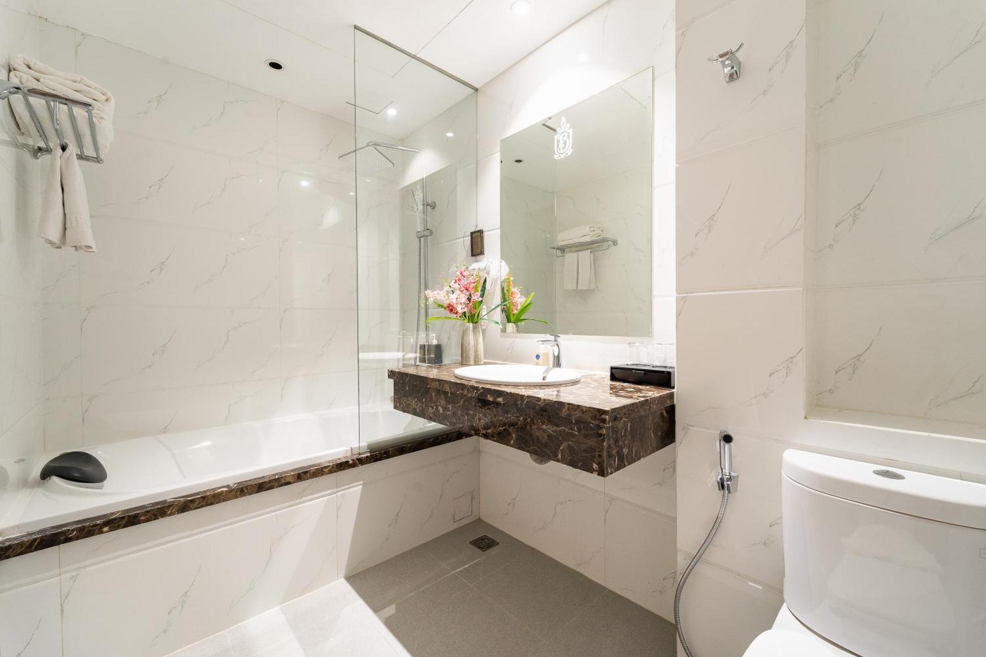 Nicecy Hotel Suites & Spa Cidade de Ho Chi Minh Quarto foto